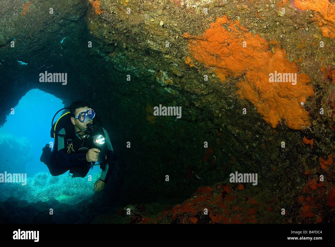 diver in cave Stock Photo