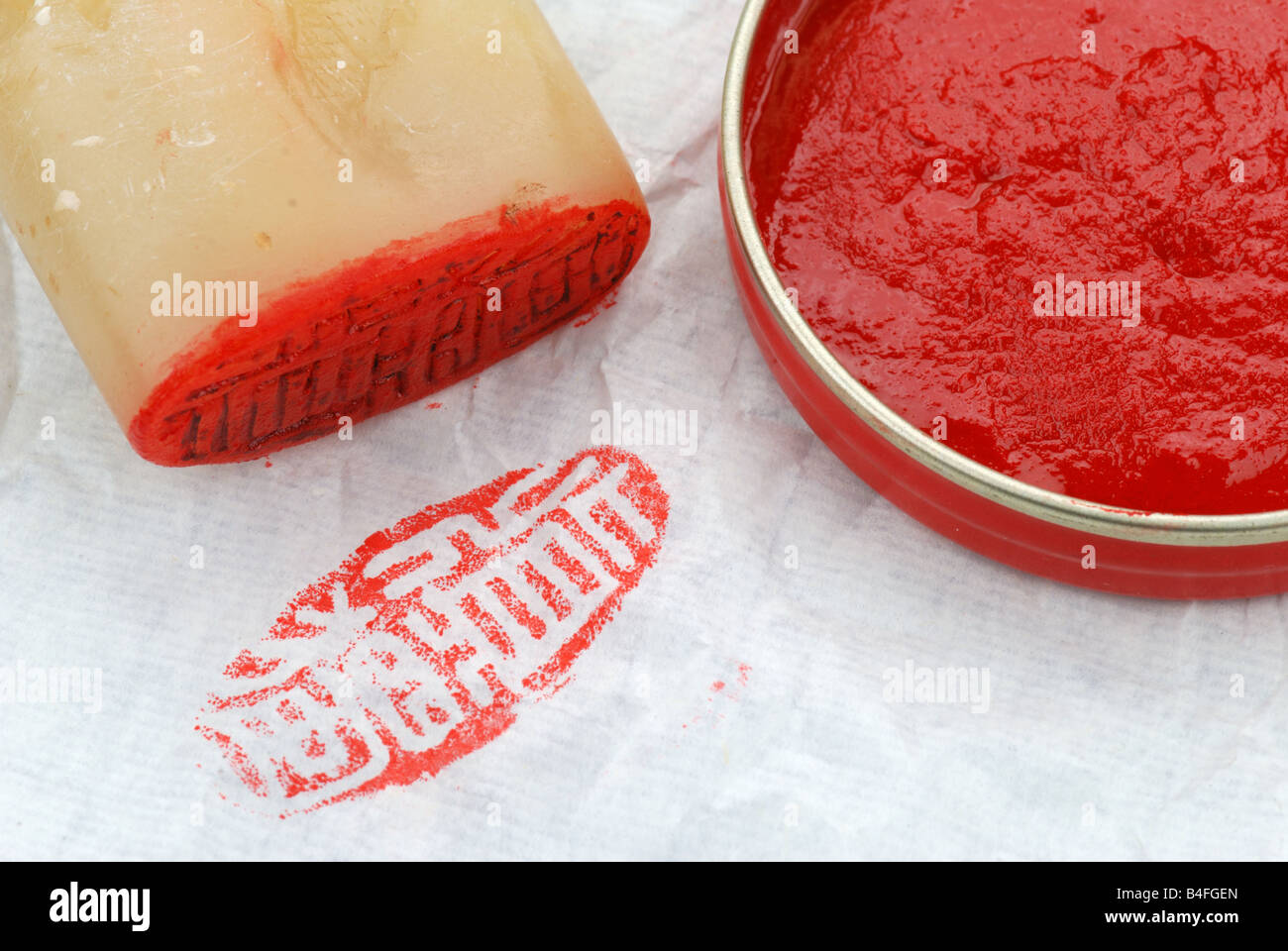 red ink and stamper Stock Photo