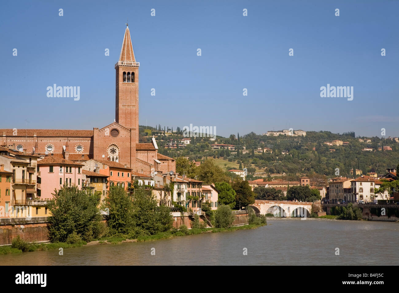 Chiesa di Sant Anastasia church and the Roman bridge, Ponte Pietra, by the Adige River, Verona, Italy Stock Photo