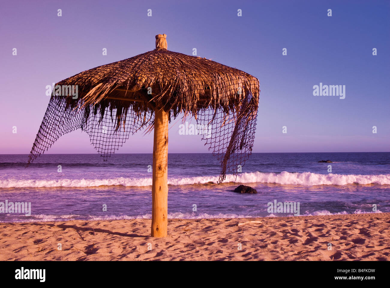 Palapa on beach at sunset near Punta Gorda in Baja California Sur Mexico Stock Photo