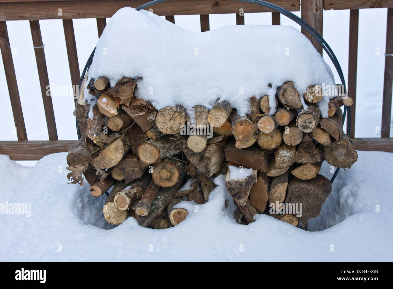 Snow covered firewood rack Putnam Connecticut USA Stock Photo