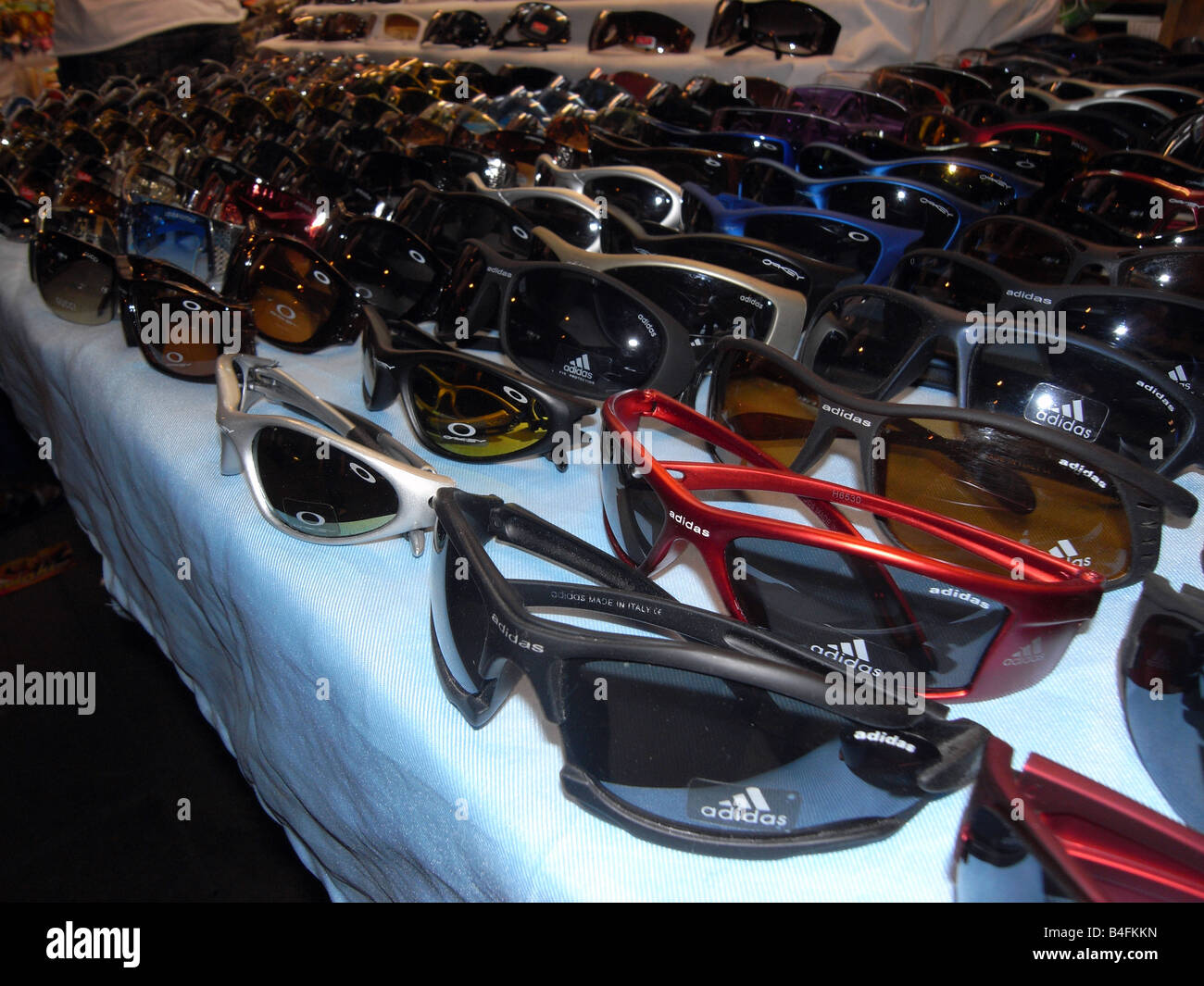 Conterfeit desgner goods. Street  vendors. Patpong Night Market Bangkok. Thailand. Stock Photo