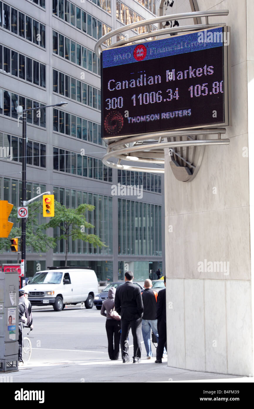 Live Canadian stock market information display board at King and Bay Financial District in Toronto Canada Stock Photo