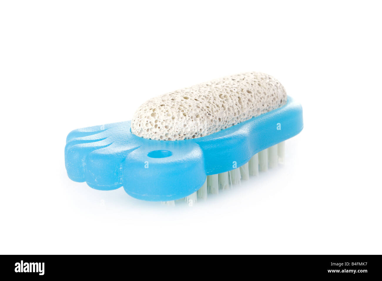 Brush and pumice stone for foot care isolated on white background Stock