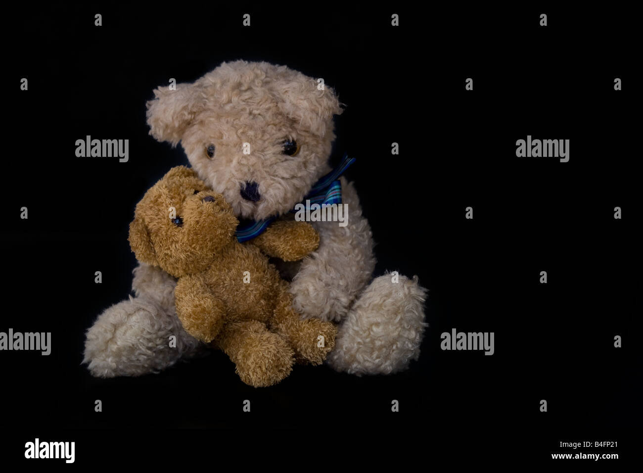 Cuddling teddy bears Stock Photo Alamy