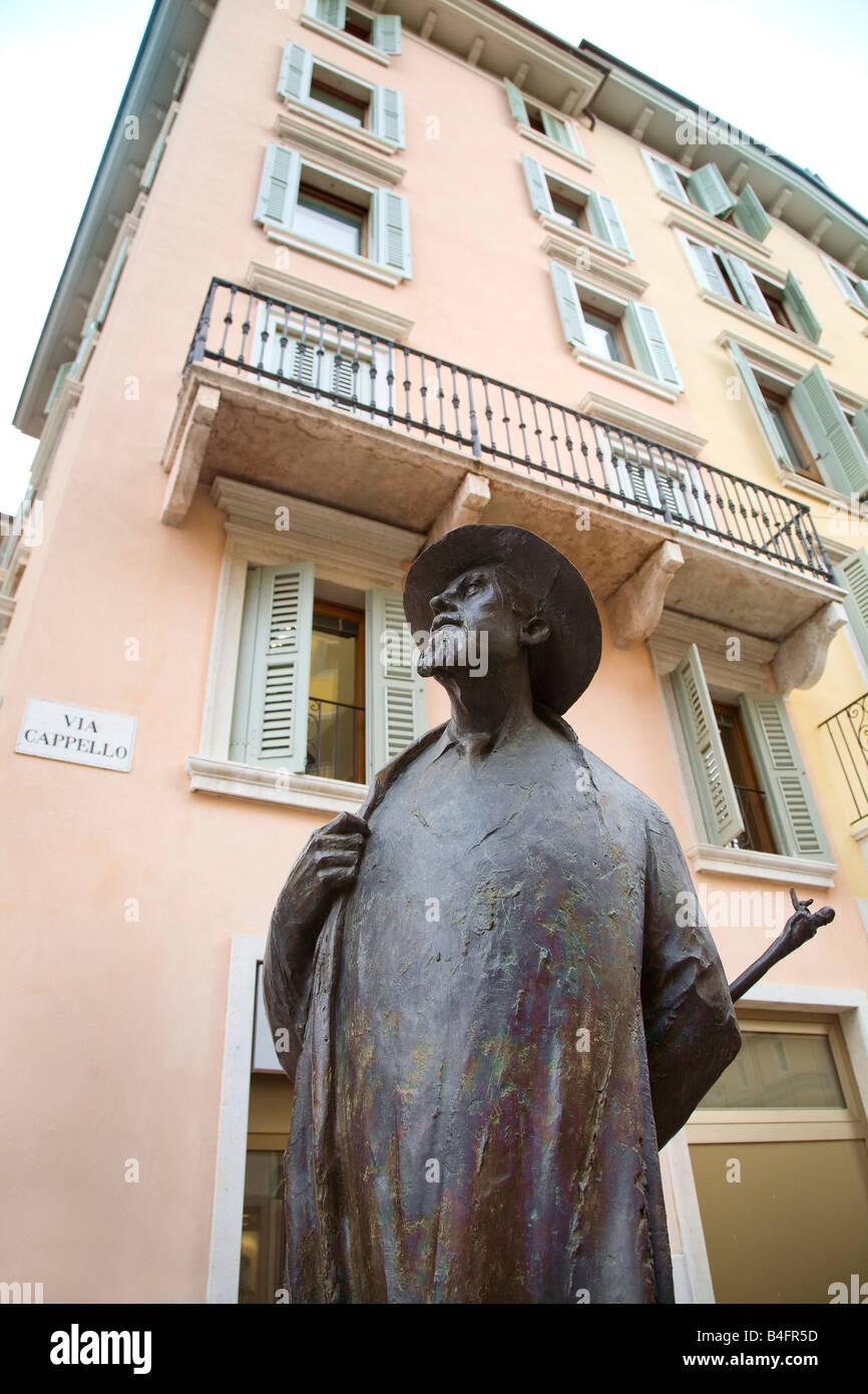 Modern bronze statue of poet Berto Barbarani in the Piazza Erbe Verona Italy created by Novello Finotti Stock Photo