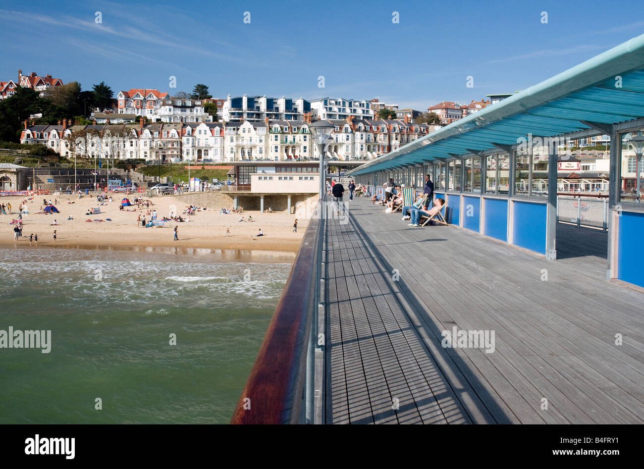 View down Pier towards the beach and seafront Stock Photo Alamy