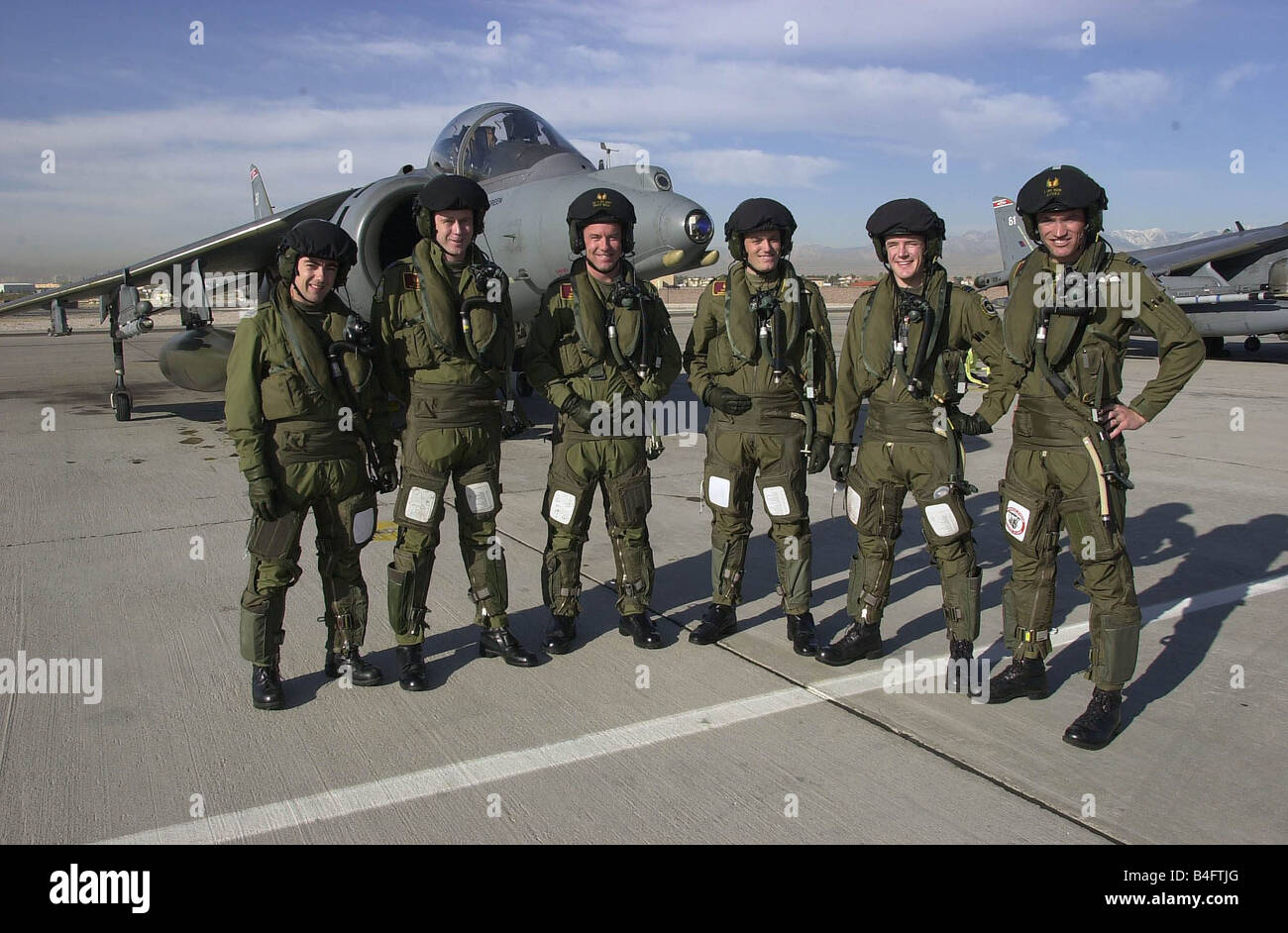 Harrier pilots from 1 Squadron get ready for Mock war at Red Flag in the Nevada USA March 2001 From Left are Flt Lt Paul Laugharne Sdn Ldr Gary Waterfall Wng Cmdr Sean Bell Flt Lt Aaron Lauder Flt Lt Mark Green and Flt Lt Chris Averty Stock Photo
