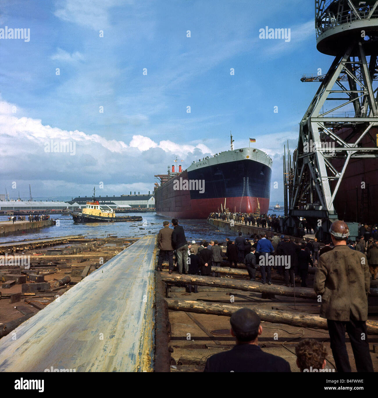 Giant Oil Tanker Myrina launched at Belfast watched by the dock workers September 1967 Stock