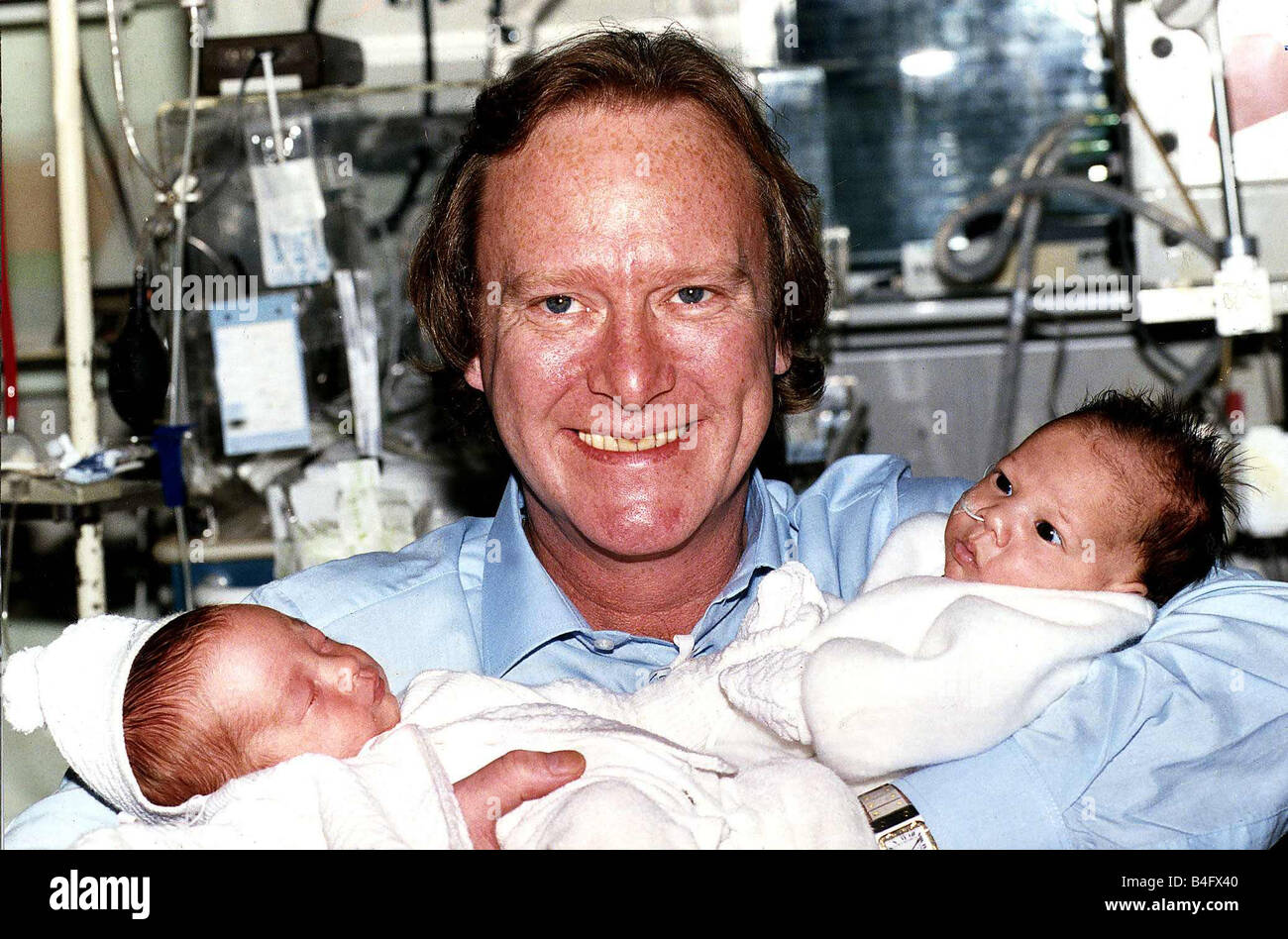 Denis Waterman Actor with two babies that were born premature at Guy s Hospital Evelina Childrens Unit l r Jack Davies 6 wks old and Lewis Barra 7 wks old Denis visited the unit at the start of Guy s sponsor a cot appeal Dbase Mirrorpix Stock Photo