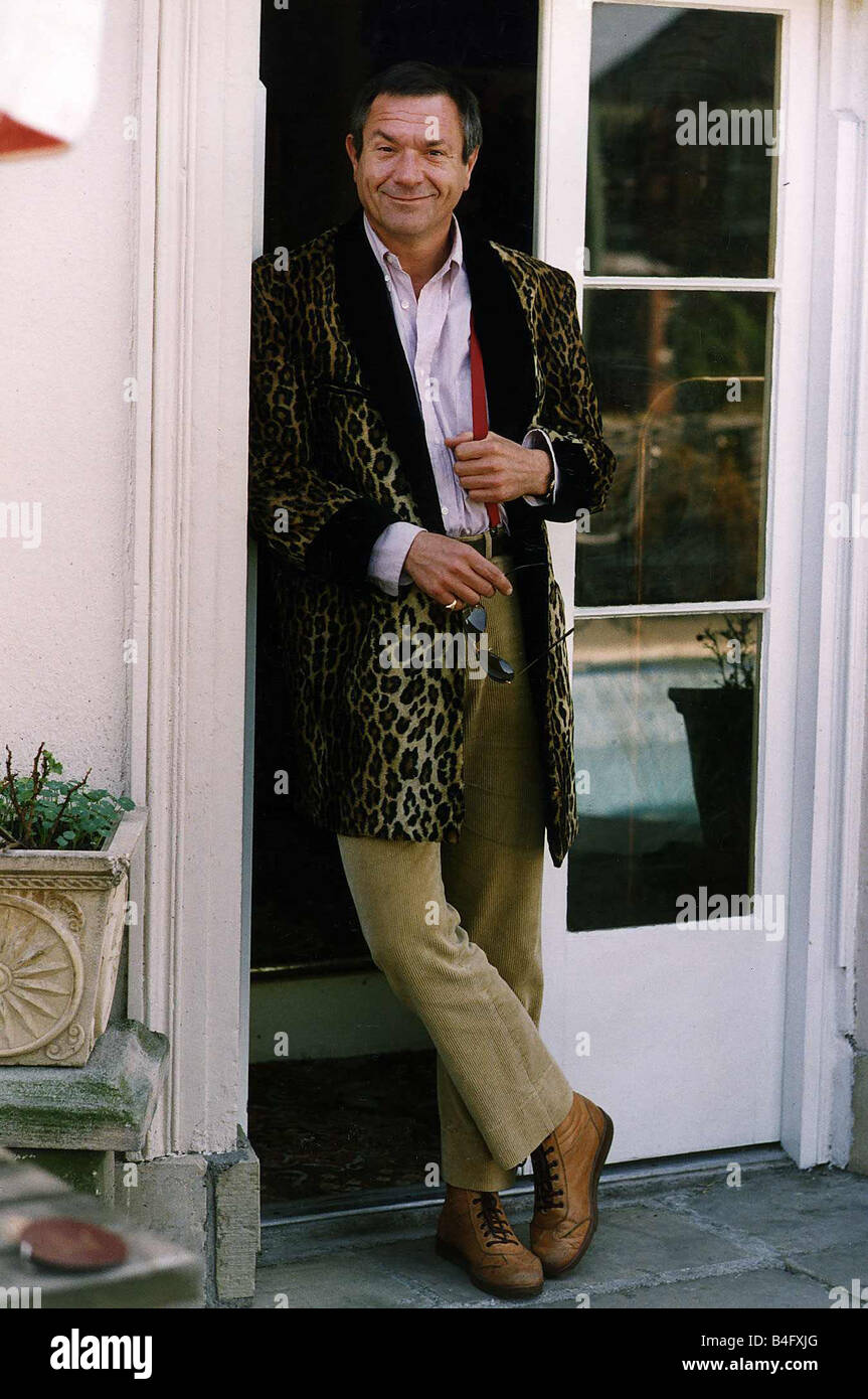 Michael Elphick Actor in Leopard skin pattern drape jacket Mirrorpix Stock Photo