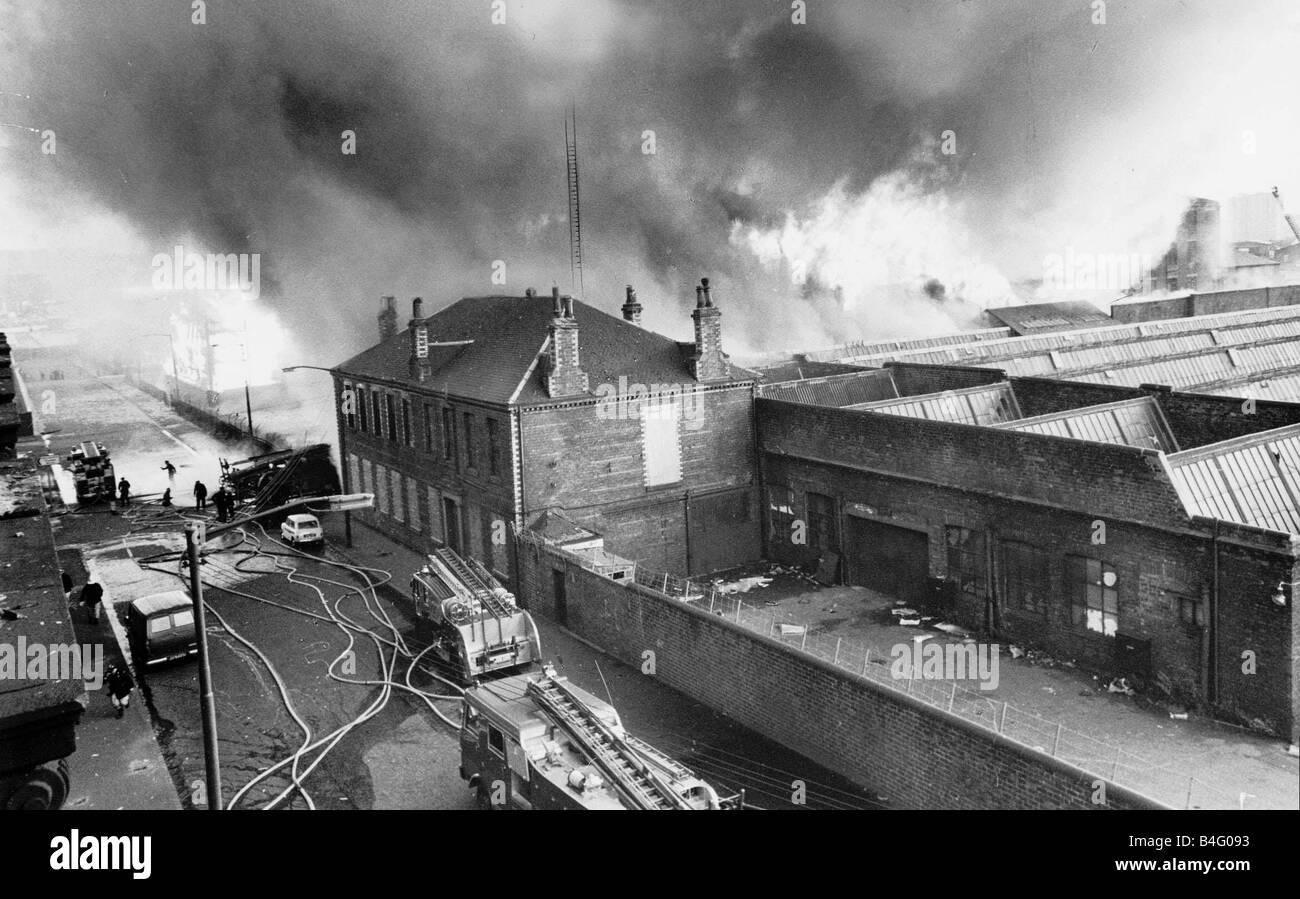 Building a blaze at a factory fire in Dalmarnock Glasgow August 1970