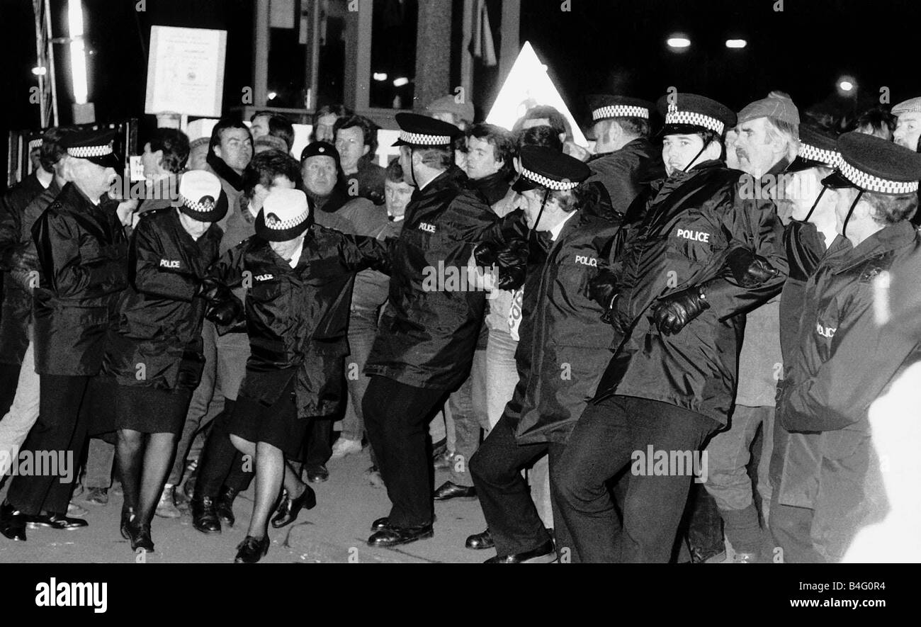 Police holding back the crowd at Bilston Glen picket line during the