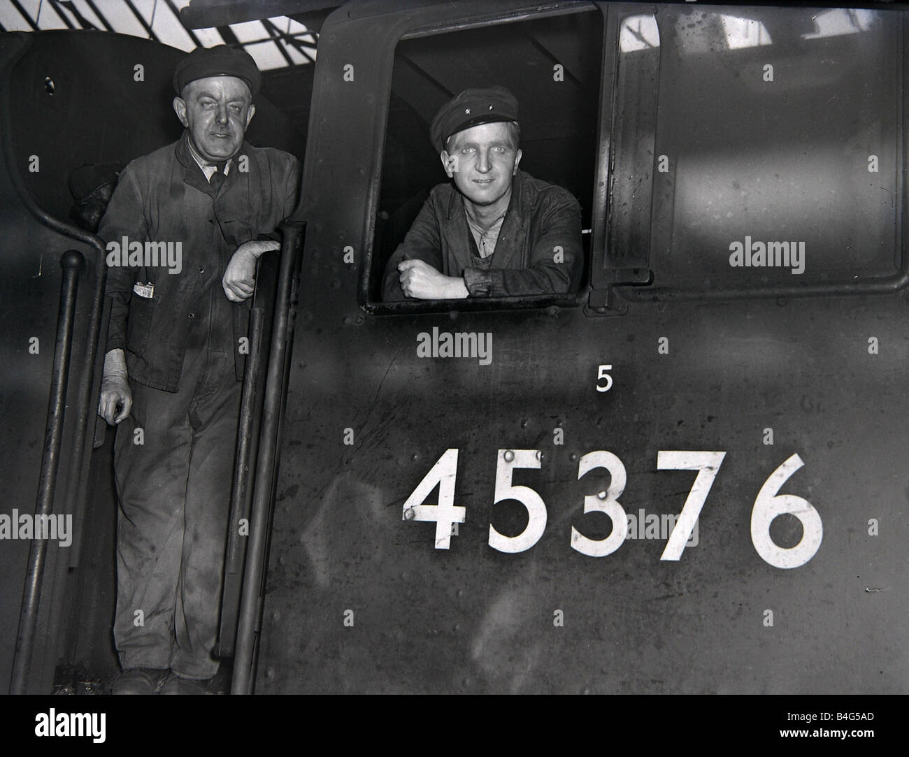 Engine driver and fireman on the footplate of thier locomotive at Charing Cross station June 1950 Stock Photo