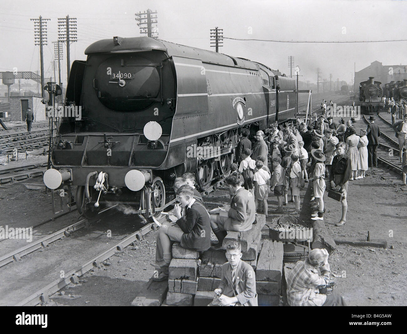Boy scouts train spotting admire the steam during an open