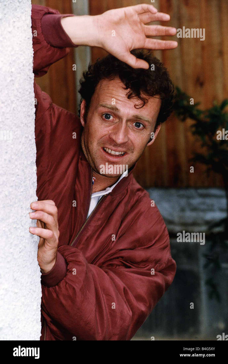 Paul Usher Actor from TV Brookside leaves shop just before fire and