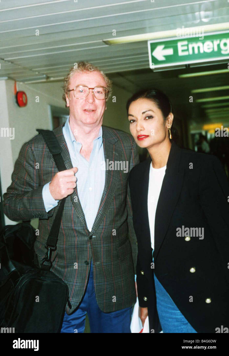 Michael Caine Film Actor with his wife at London Airport Stock Photo ...