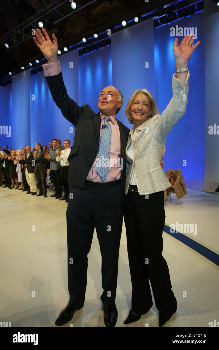 Michael Howard with his wife Sandra waves farewell after his speech at Tory conference in Blackpool 2005 was the last conference Michael Howard addressed as party leader Stock Photo