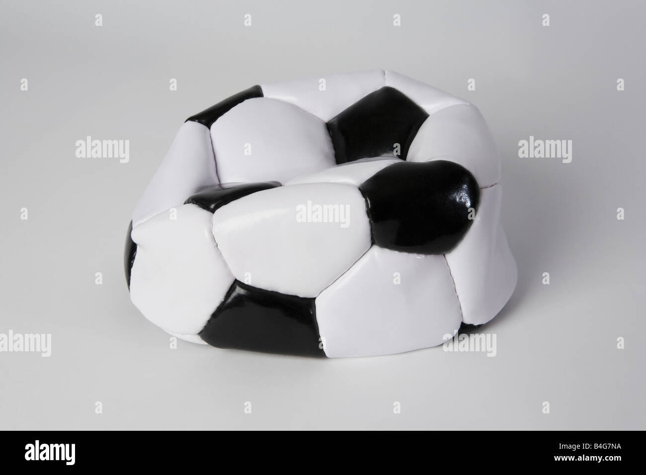 A deflated soccer ball Stock Photo Alamy