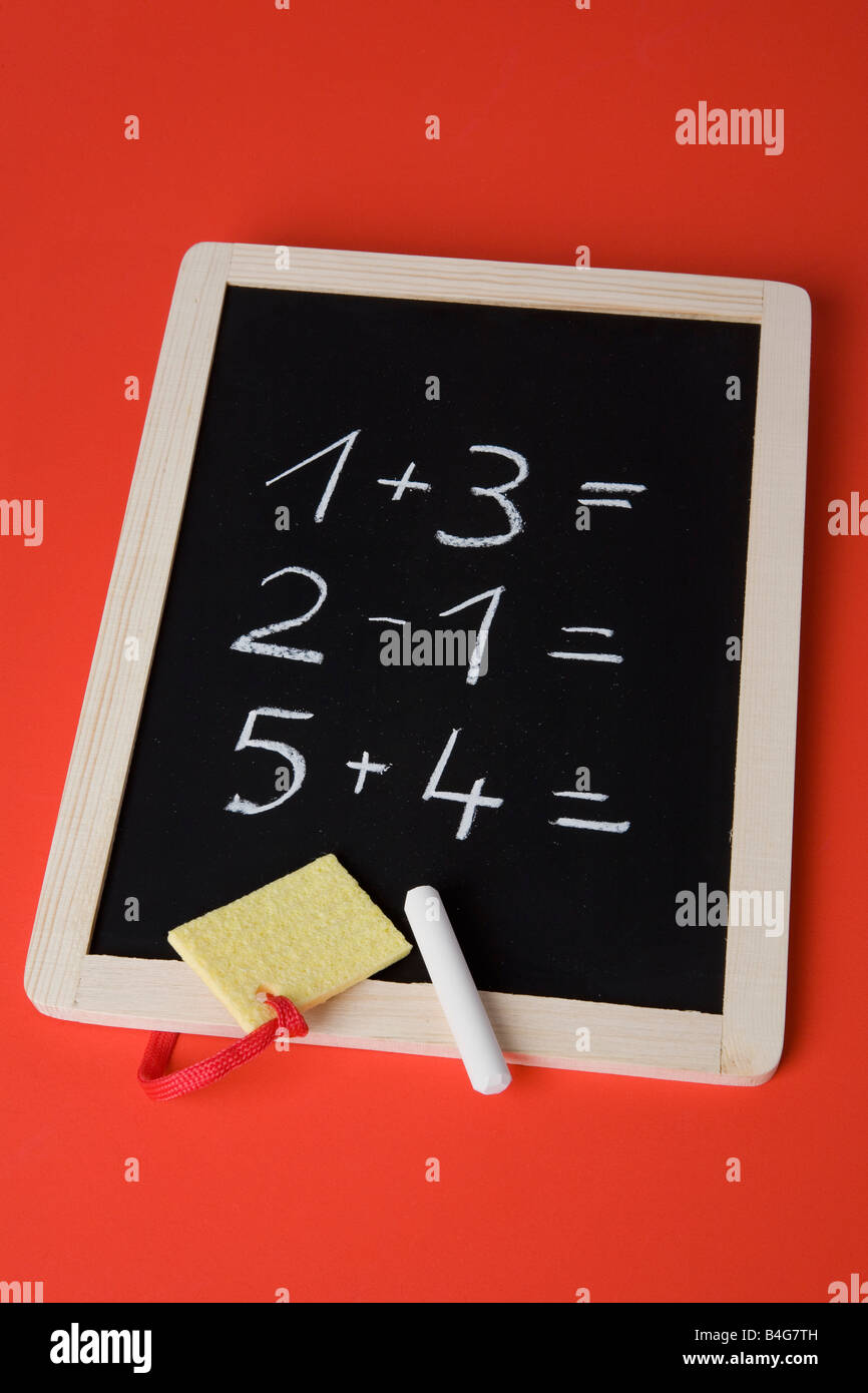A chalkboard with math problems written on it Stock Photo