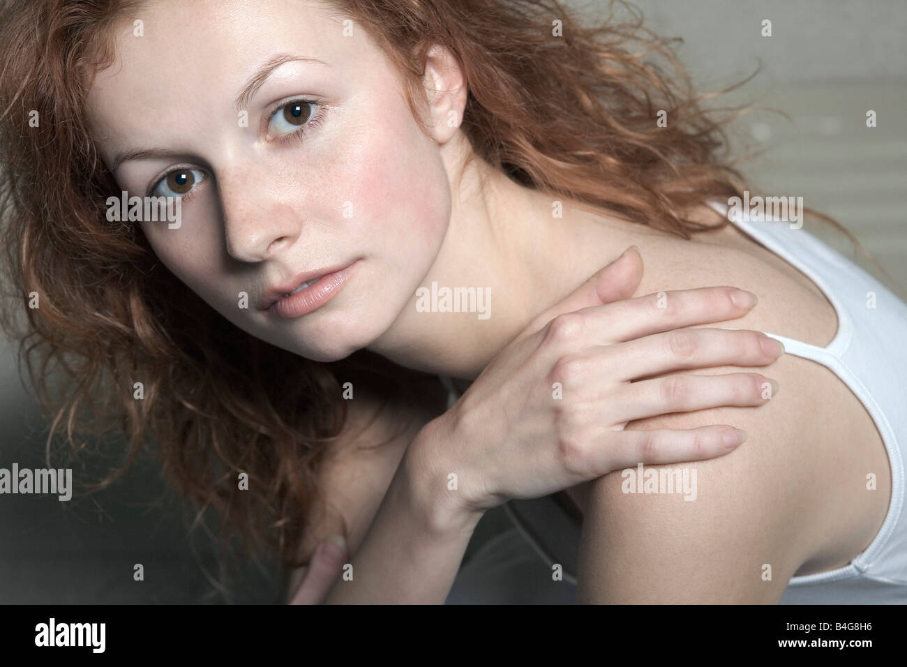 Portrait of a young woman with red hair Stock Photo