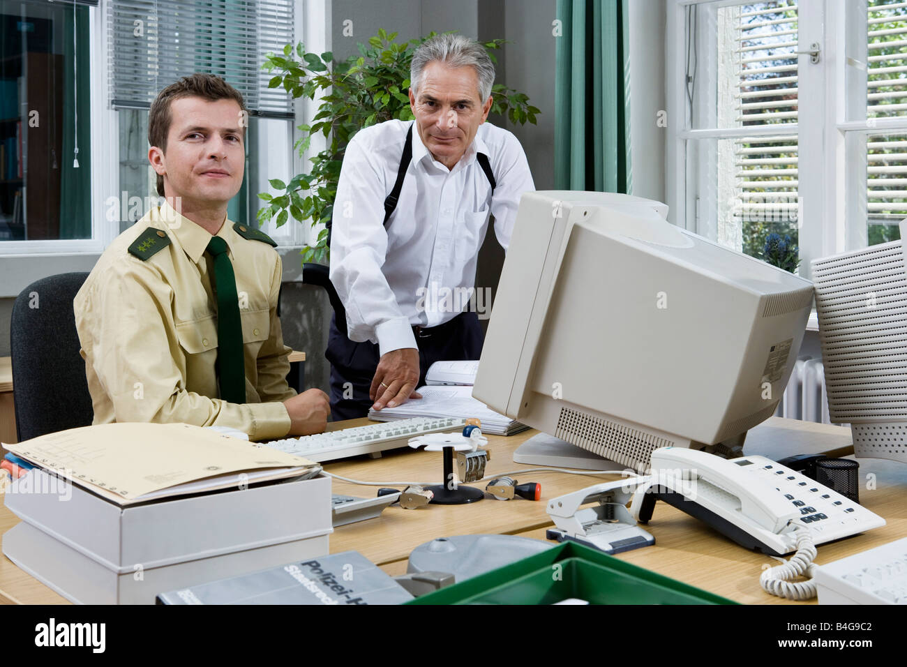 Two standing officers hires stock photography and images Alamy