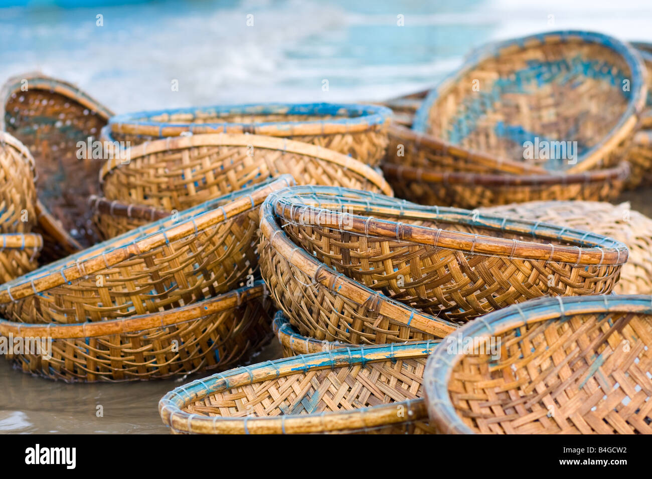 Bamboo baskets on the beach at a fishing village Stock Photo Alamy
