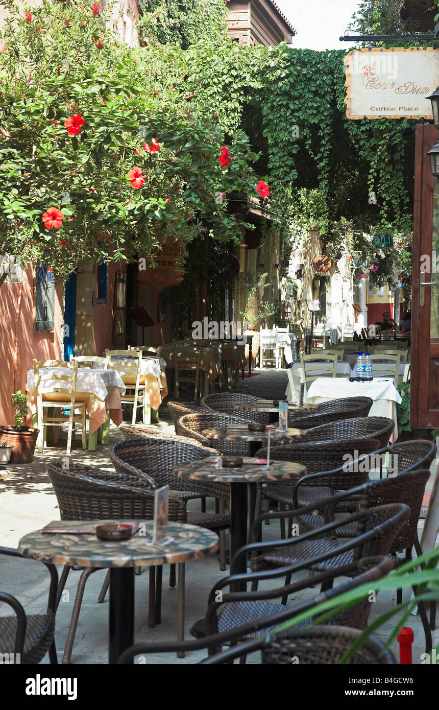 Tables and chairs in outdoor coffee place Rethymnon Old Town Greece