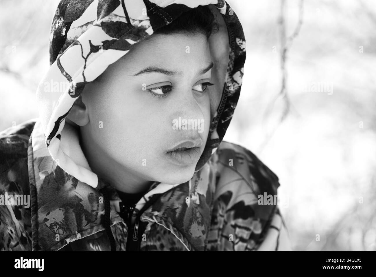 Teenage Boy In Camouflage Clothing Stock Photo