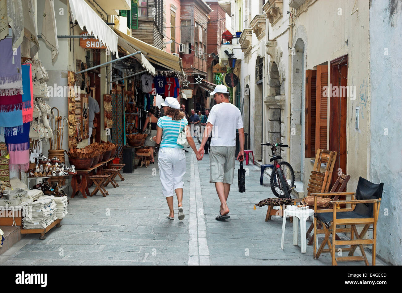 Tourists walking narrow streets of Old Town Rethymno Crete island Greece September 2008 Stock Photo