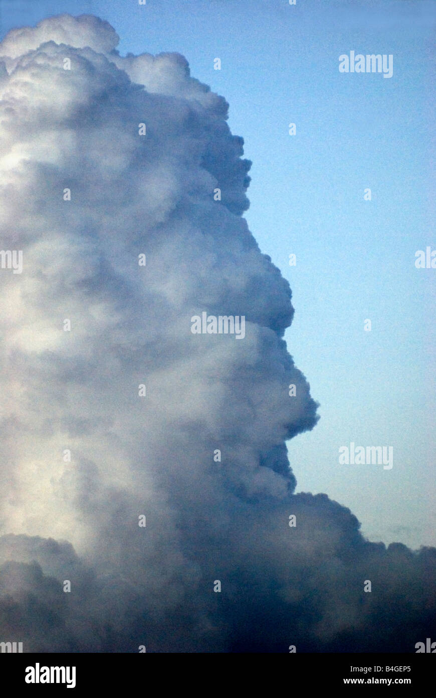 face of old man in cloud formation Stock Photo
