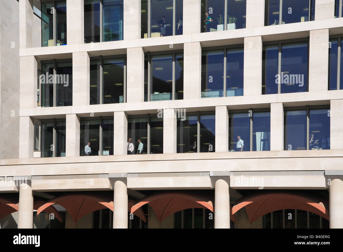 London Stock Exchange Building and traders in the window Paternoster Square the City of London England UK Stock Photo