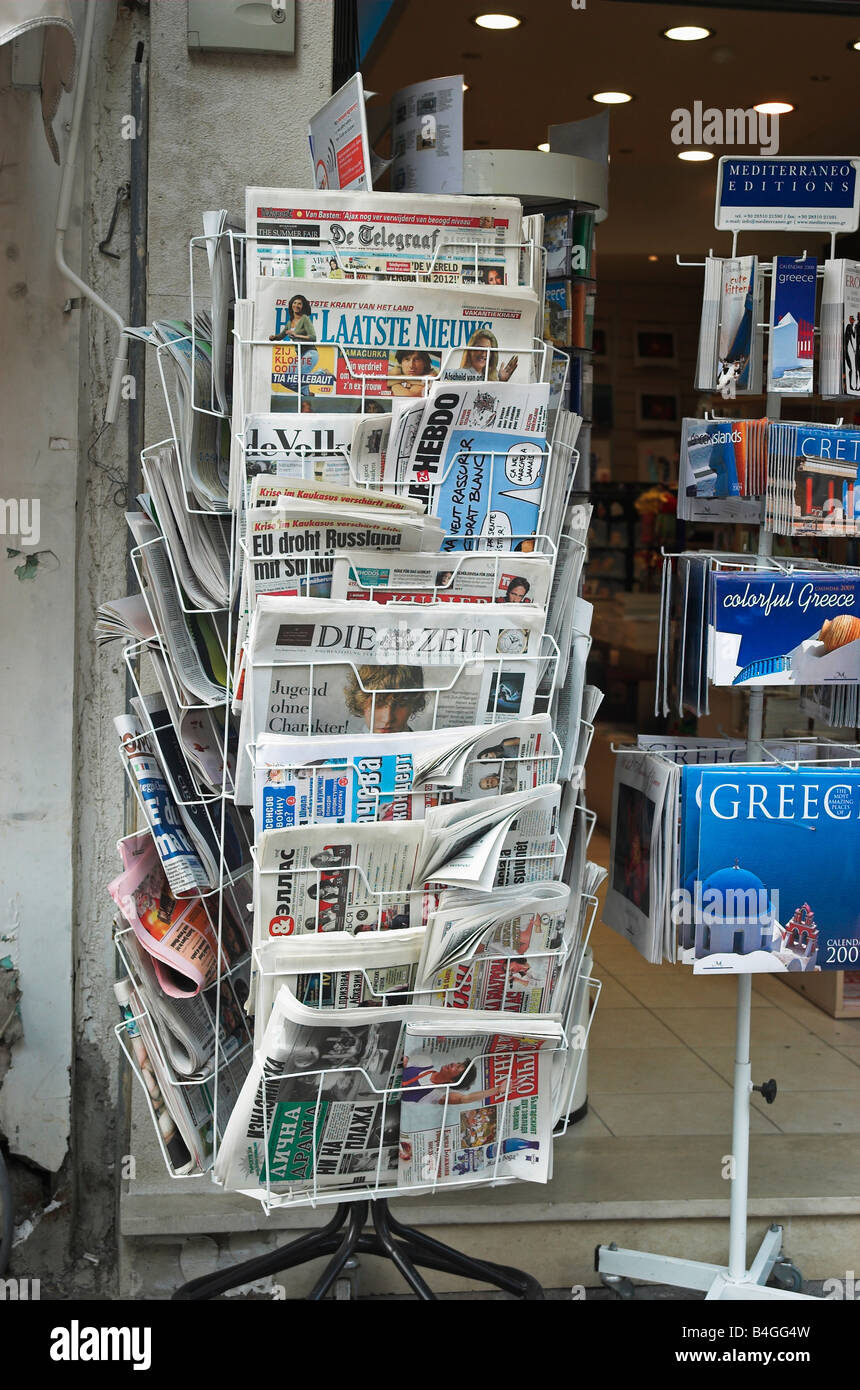 International daily newspapers for sale at a newspaper stand Rethymnon