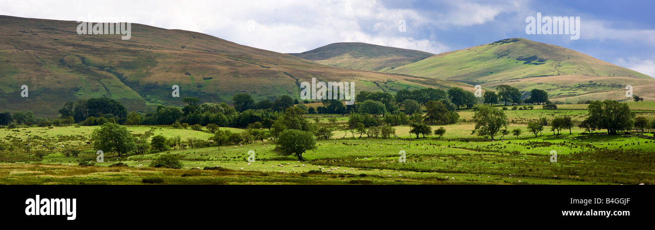 Caldbeck Fells in the English Lake District Cumbria England UK showing the Caldbeck valley floor and Back O'Skidda Fells Stock Photo