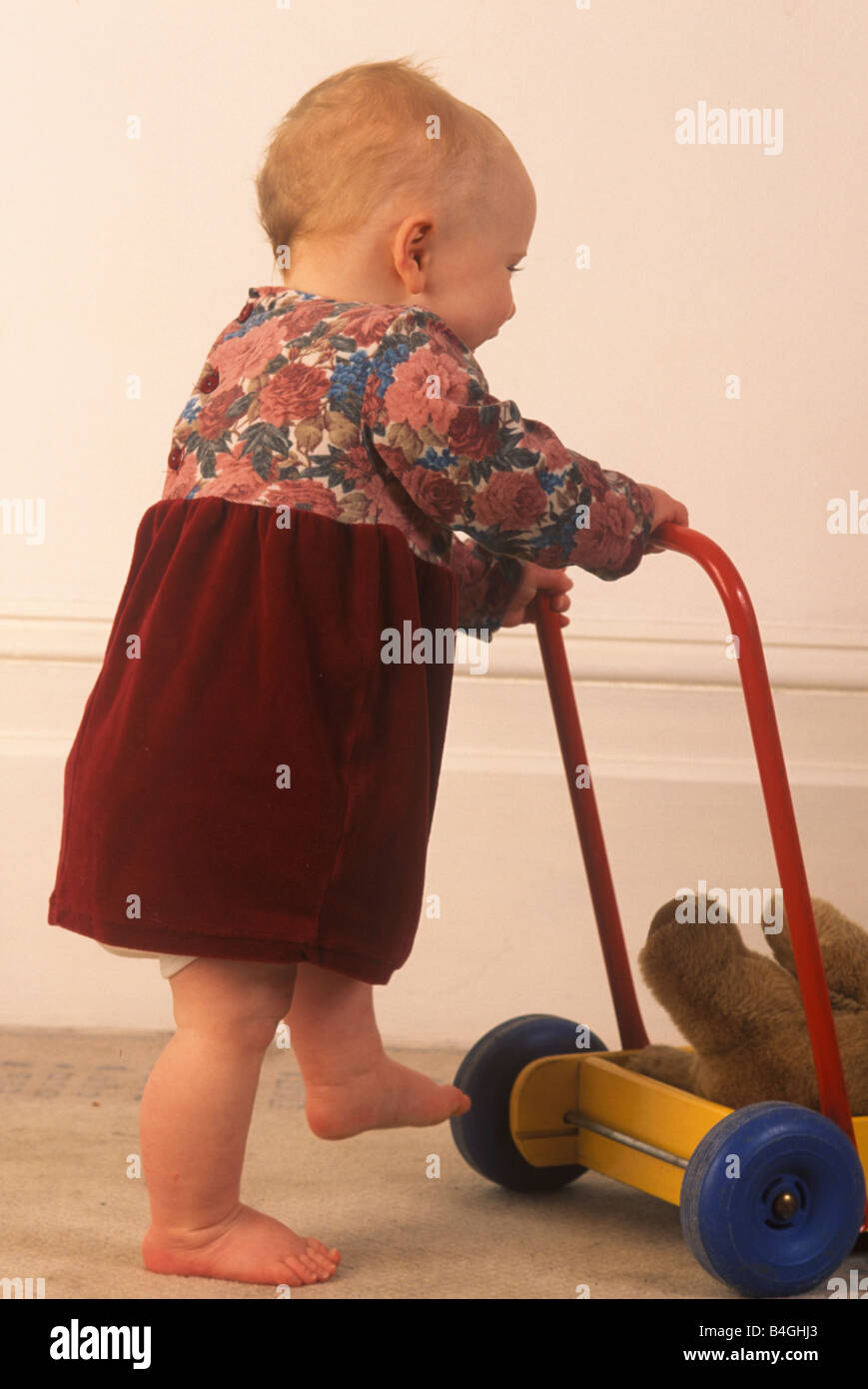 Baby walking push cart hi-res stock photography and images - Alamy