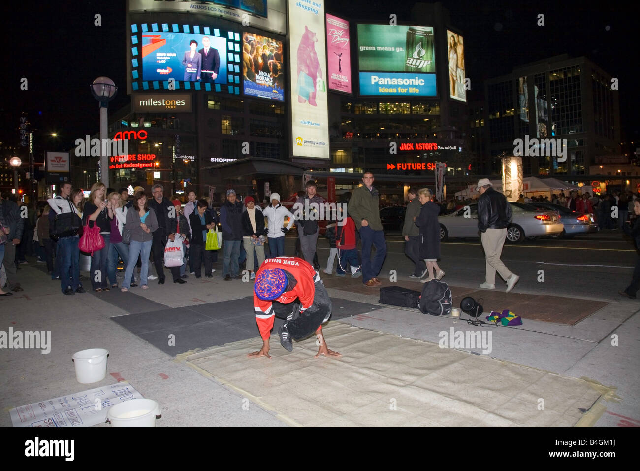 Downtown Toronto at Dundas Square on Yonge Street showing entertainment