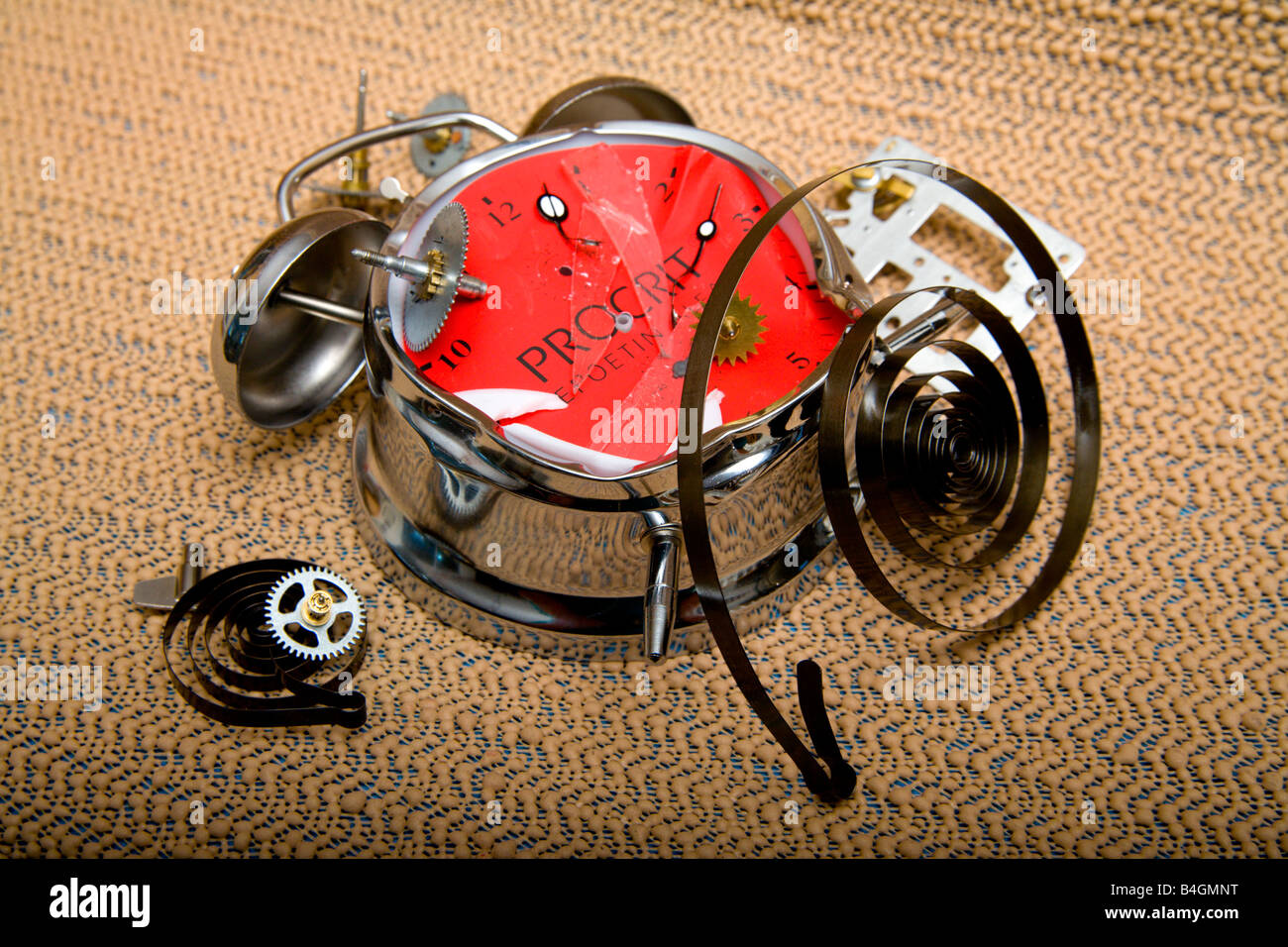 Smashed alarm clock in pieces Stock Photo Alamy
