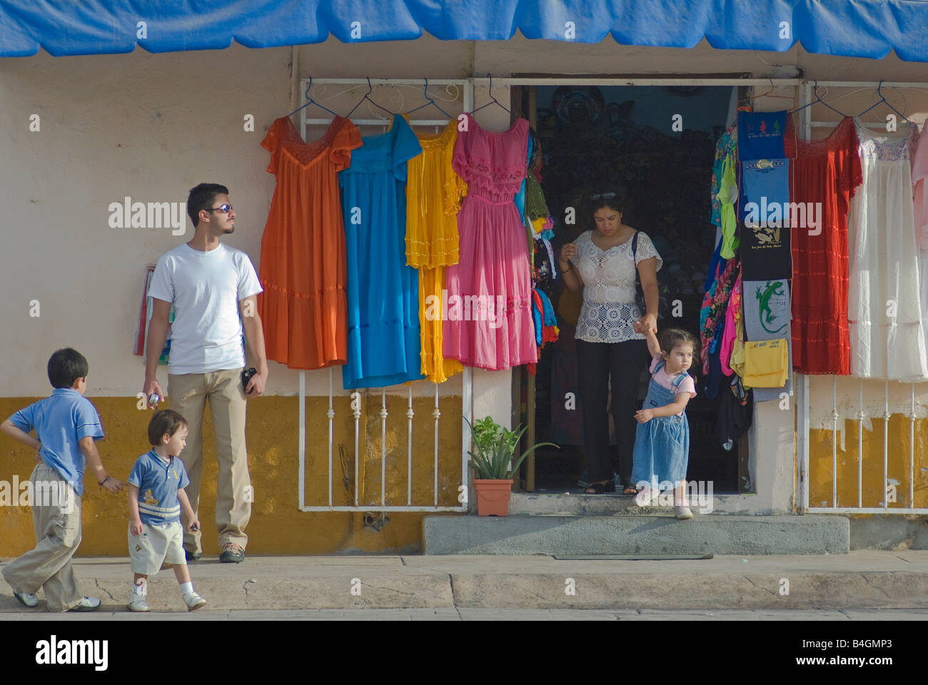 Families at shop on Plaza Mijares in San Jose del Cabo Baja California Sur Mexico Stock Photo