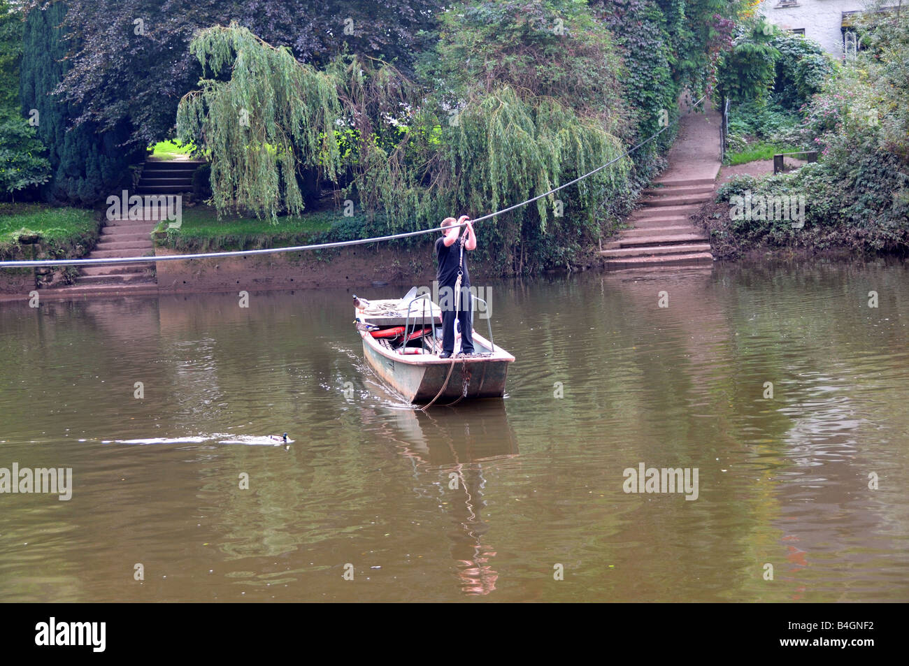 Old hand pulled rope ferry boat River Wye Symonds Yat Herefordshire England Stock Photo