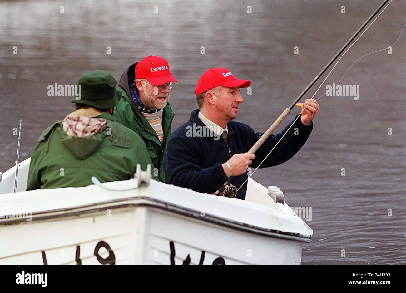 Ian Botham throwing a line on boat for the first days fishing on the