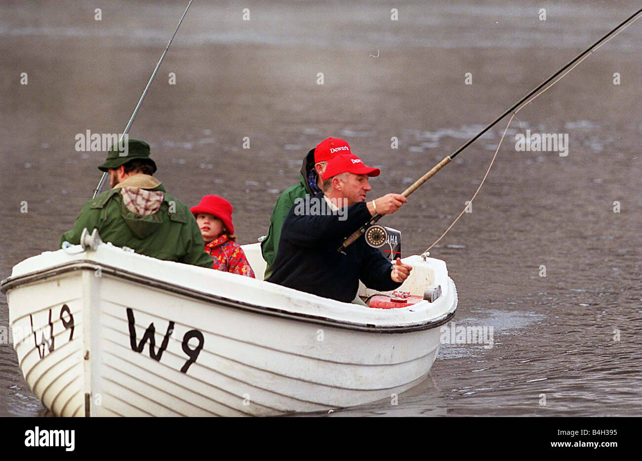 Ian Botham throwing a line on boat for the first days fishing on the