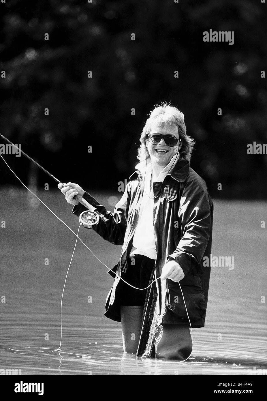 Bruno Brookes Disc Jockey practices his fly fishing in one of the ponds near his home in Hampstead North London August 1987 Stock Photo