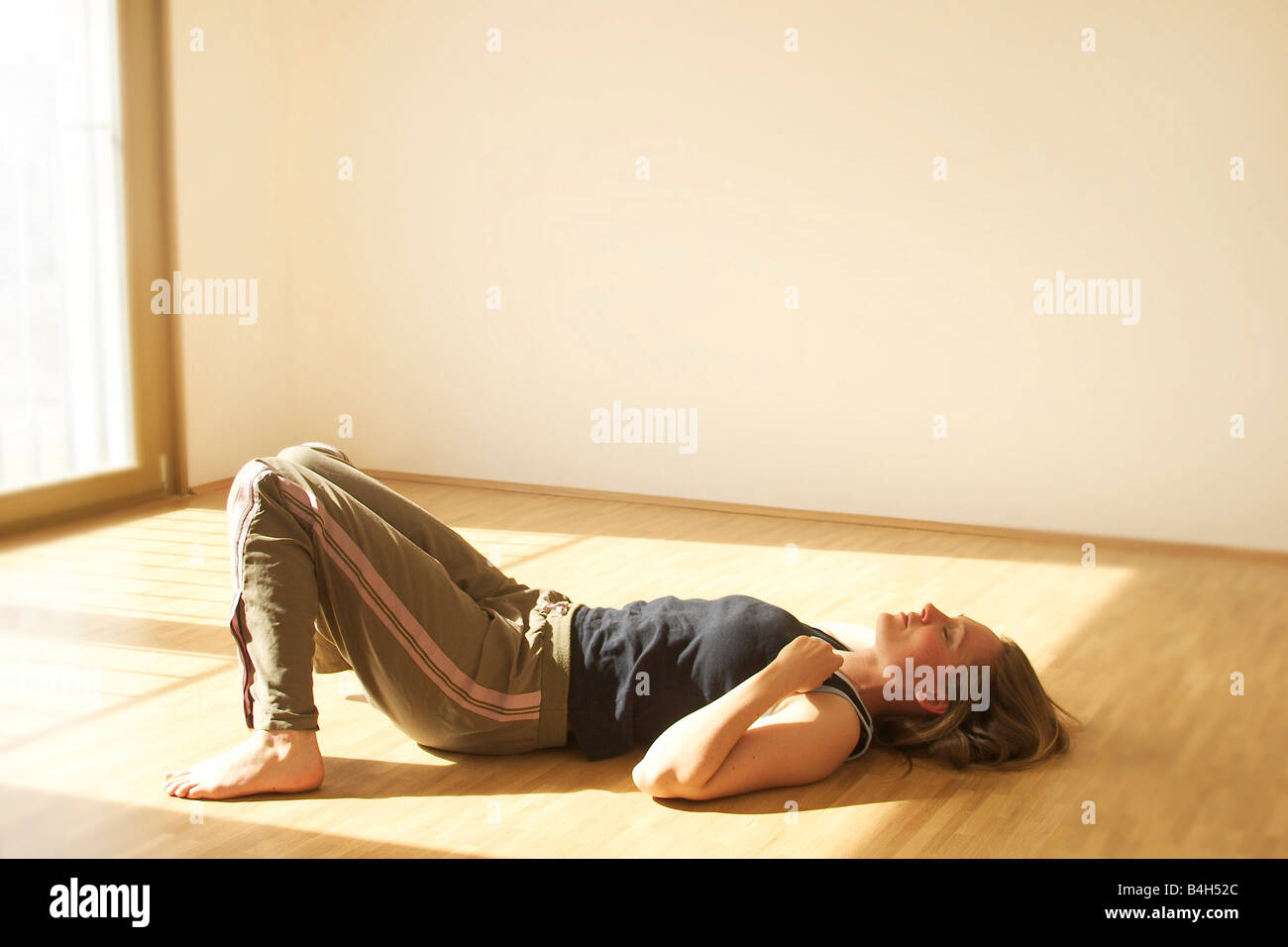 Young Woman Sleeping On Wooden Floor Stock Photo 20046164 Alamy