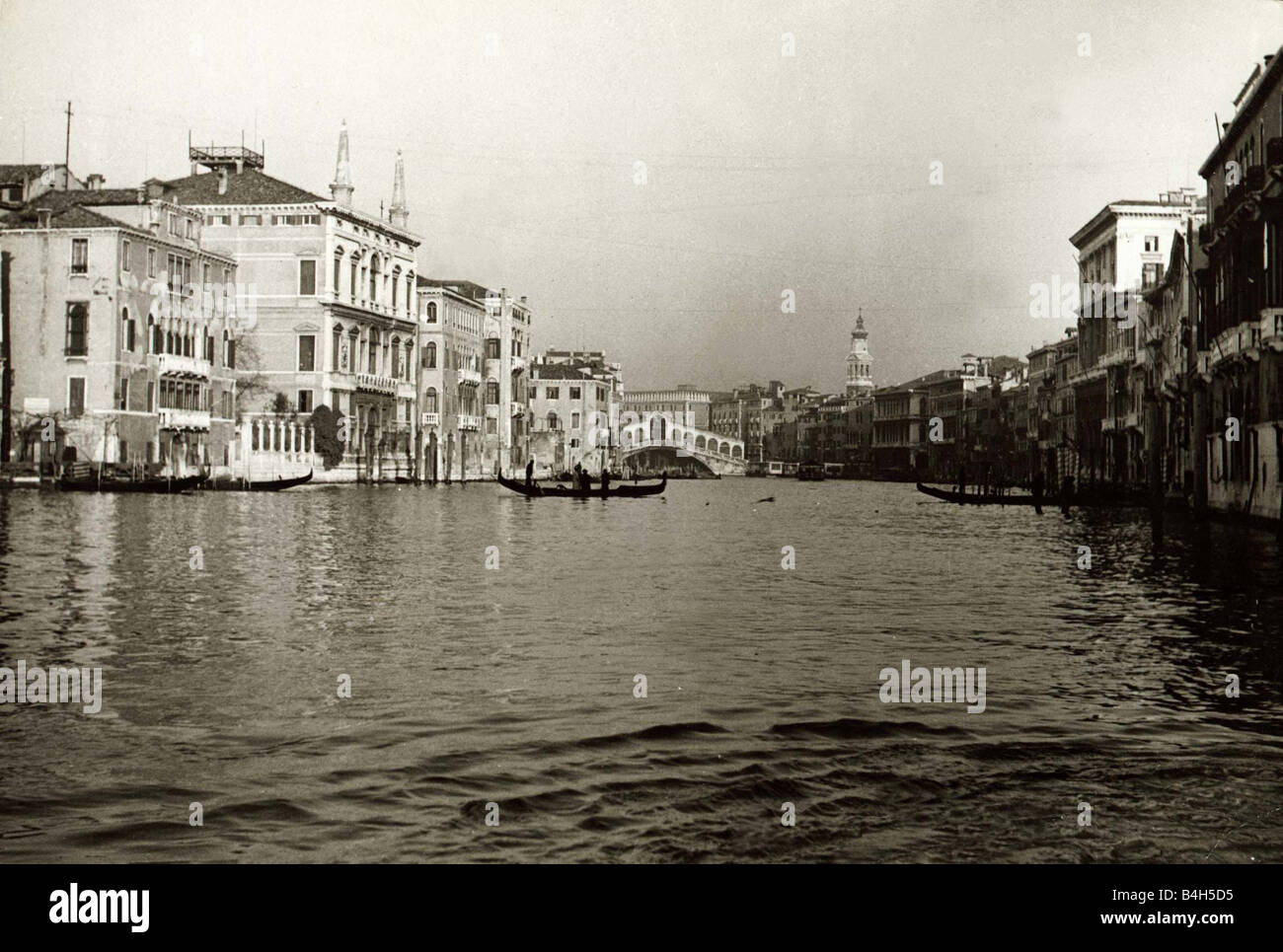 The Grand Canal with the Rialto Bridge in the background which was made  famous in Shakespeare s Merchant of Venice circa 1960 Stock Photo - Alamy