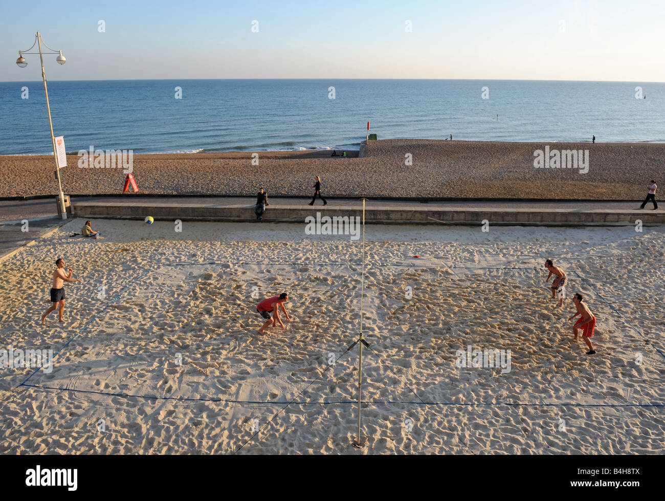 A game of beach volley ball on Brighton Beach Stock Photo Alamy