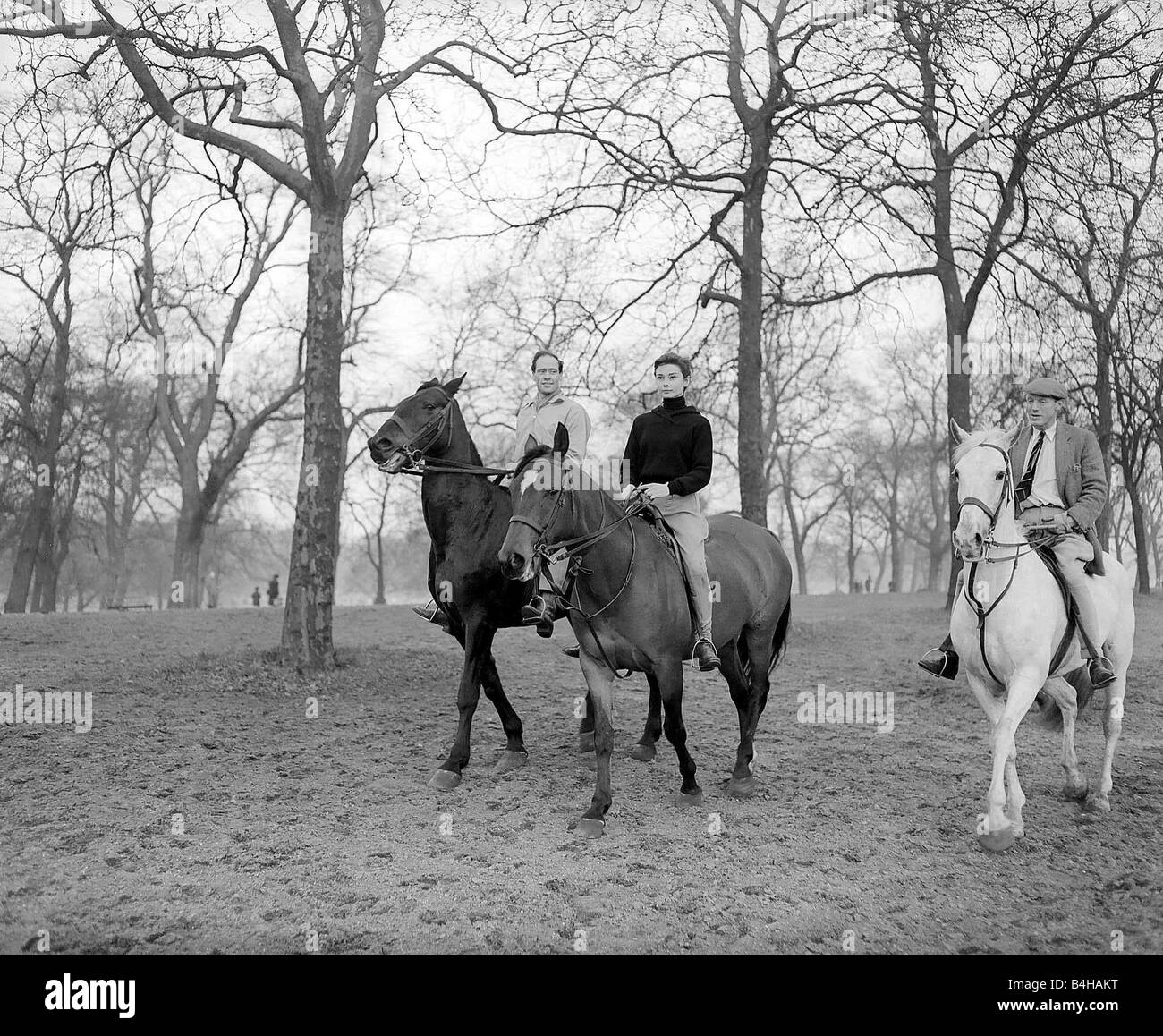 Audrey hepburn horse riding 1955 hires stock photography and images