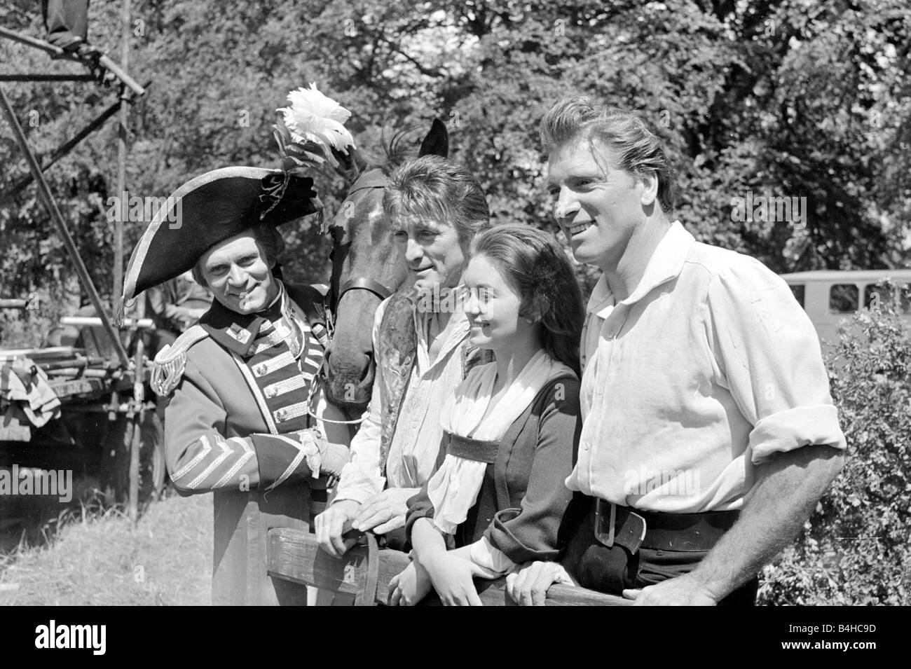Burt Lancaster with Janette Scott and other actor colleagues during the filming of The Devils Disciple July 1958 Stock Photo