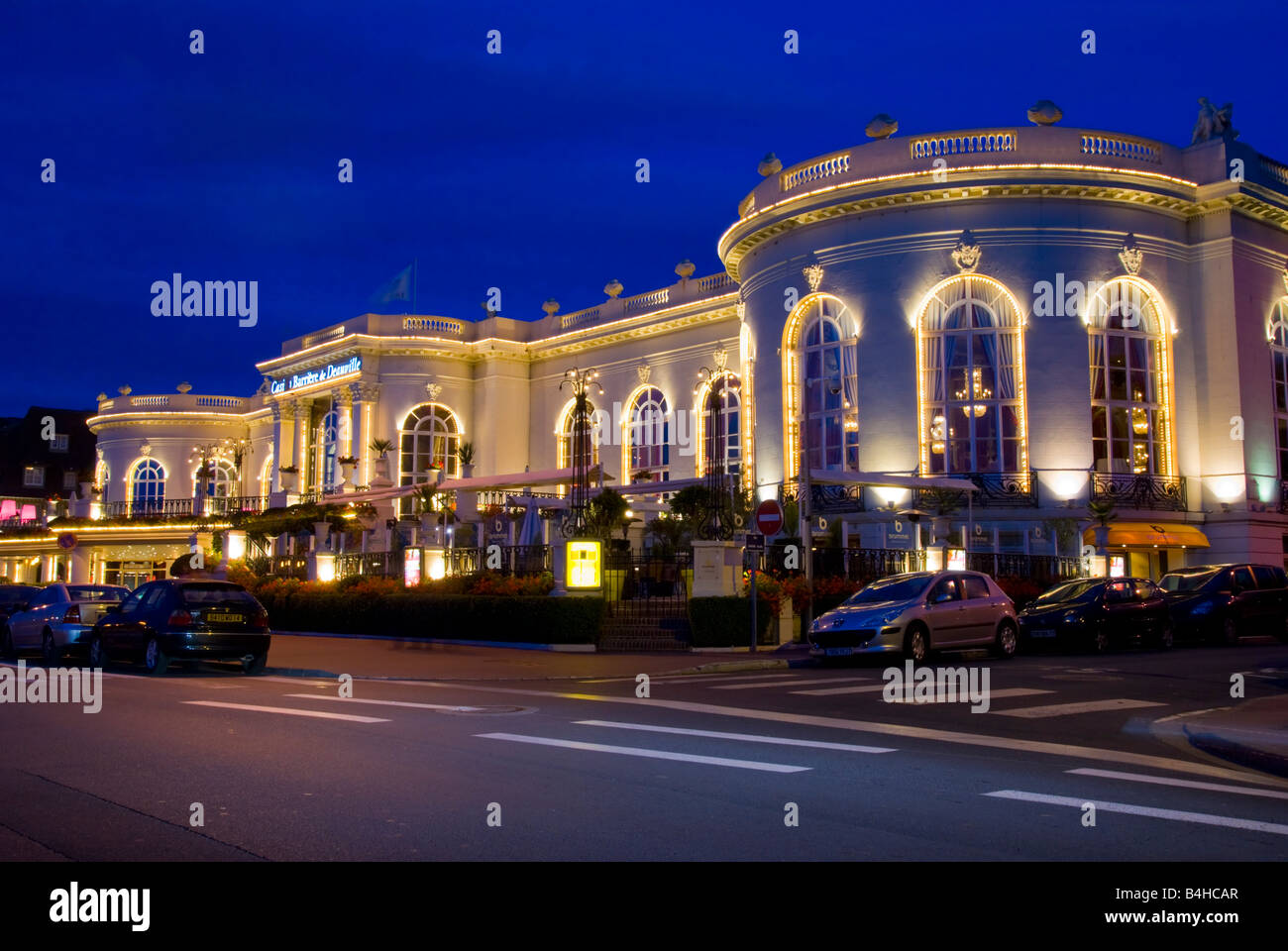 Casino lit up at dusk, Deauville, Cote Fleurie, Basse-Normandy, France Stock Photo