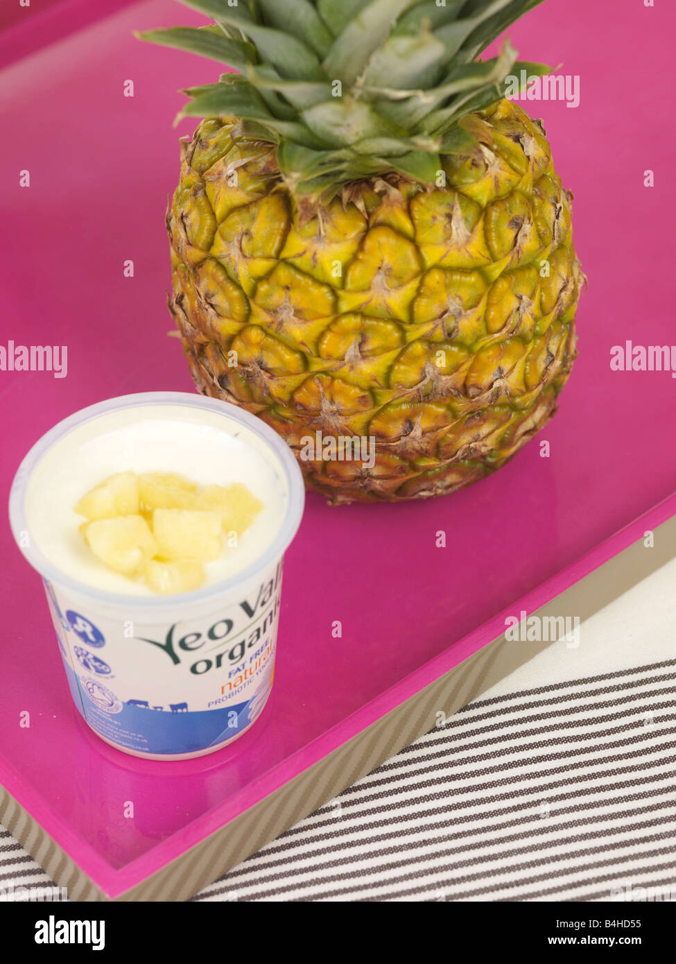 Pineapple in Yogurt Stock Photo Alamy