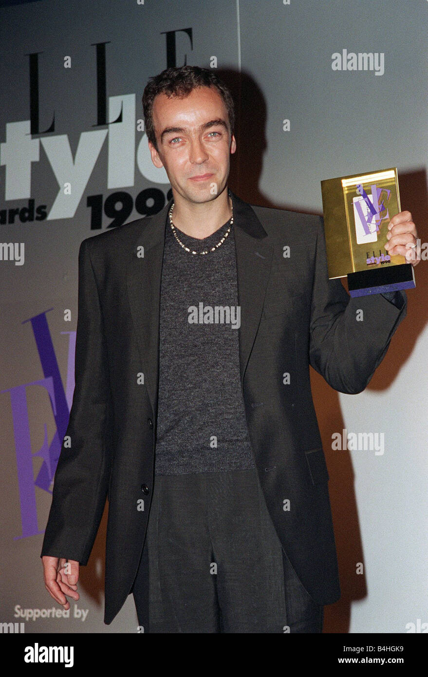 John Hannah Actor September 98 At the Elle Awards holding award he